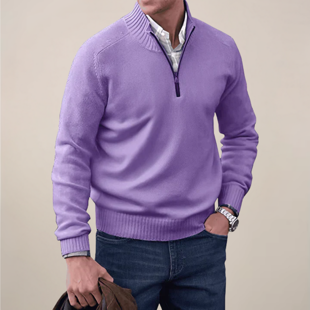 Close-up of the textured knit on a men's half-zip pullover sweater, showing quality detail.