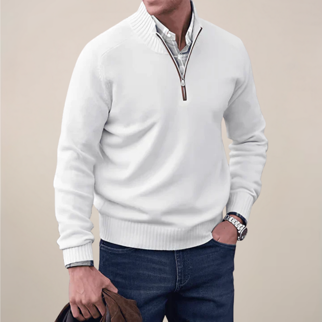 Versatile men's top: a half-zip knit sweater suitable for layering or standalone wear in spring.