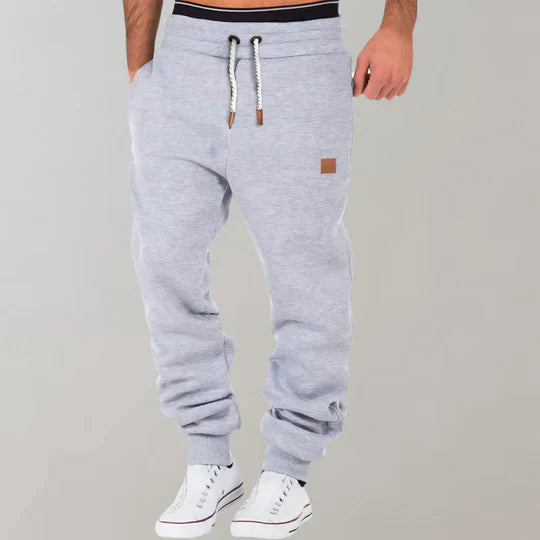 Versatile men's athletic jogging pants, perfect for activewear, workouts, or everyday casual comfort.