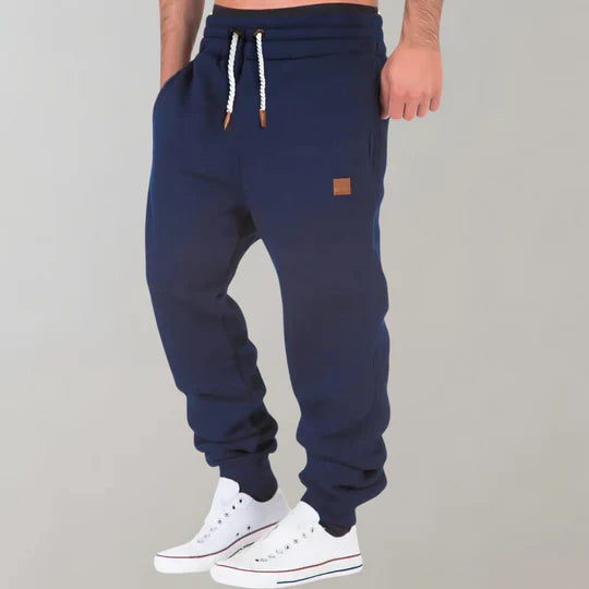 Stylish men's jogging pants in a modern fit, ideal for casual wear, lounging, or active everyday fashion.