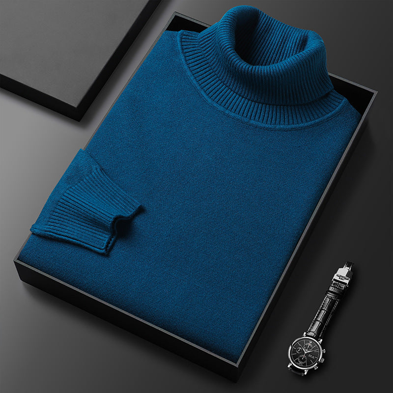 Men's turtleneck sweater paired with dark pants, a classic smart casual spring outfit.