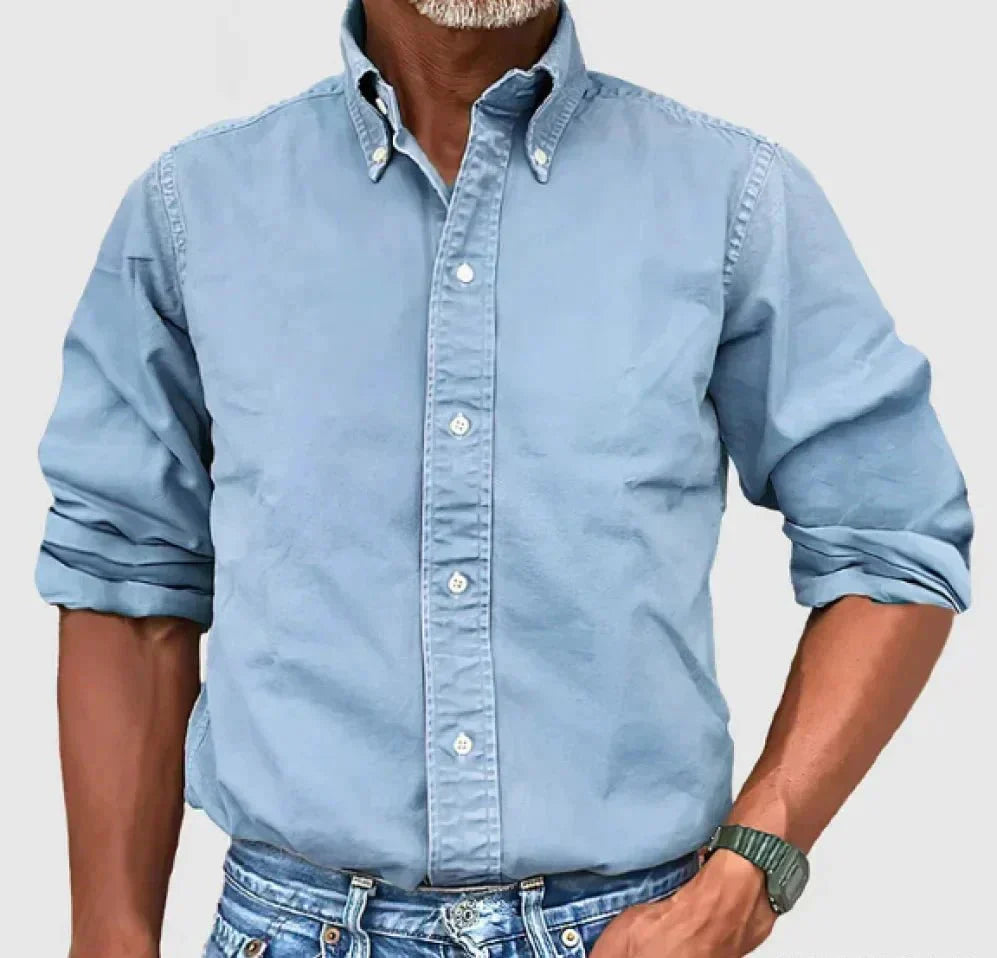 Pink men's casual long sleeve button-up shirt, adding a pop of color to apparel