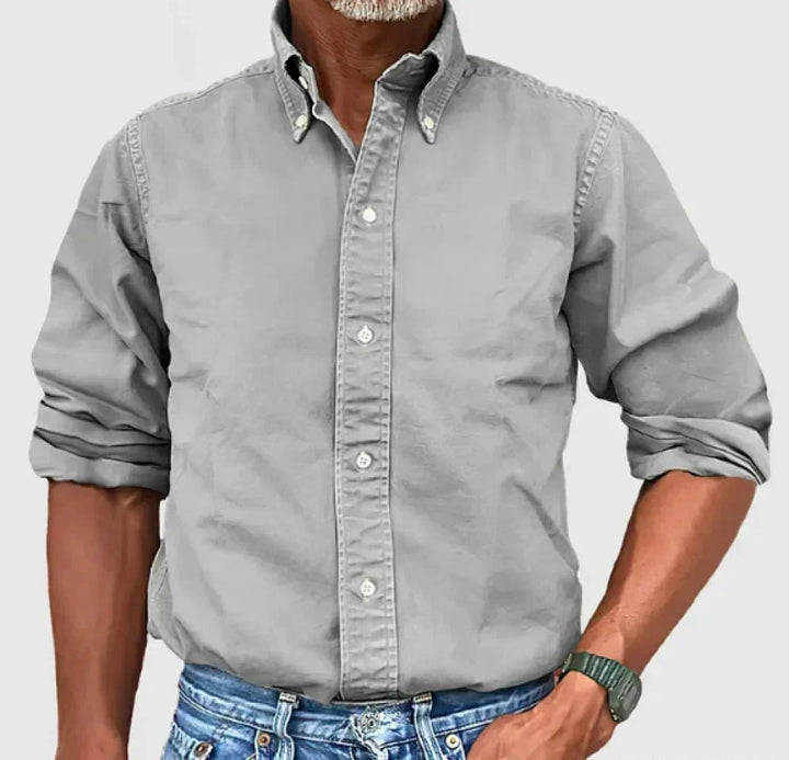 Close-up of fabric on a men's casual long sleeve button-up shirt, high quality material