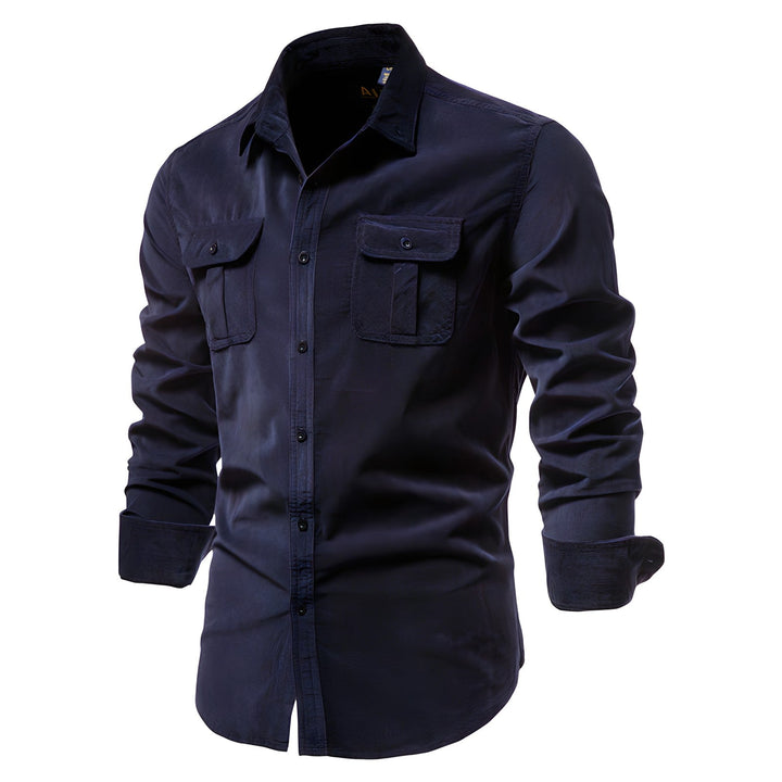 Stack of men's casual utility shirts in various colors, showcasing fabric and design