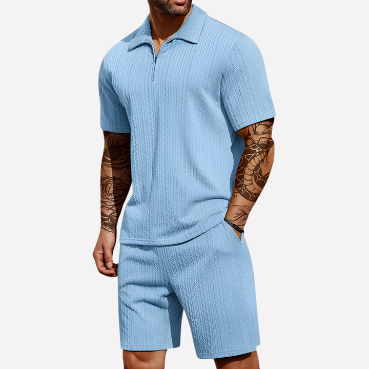 Classic men's casual quarter-zip polo and shorts, perfect for a relaxed summer style.