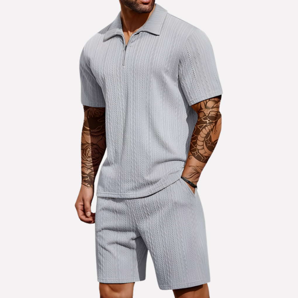 Active men's quarter-zip polo and shorts combo, suitable for light activities or casual wear.