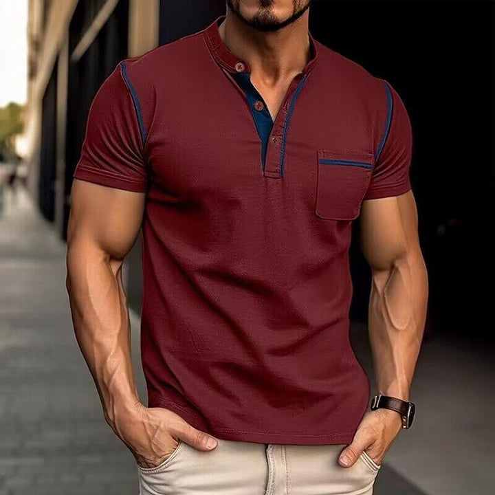 Man enjoying a casual day in a slim-fit Henley t-shirt. Comfortable men's summer top for active style.