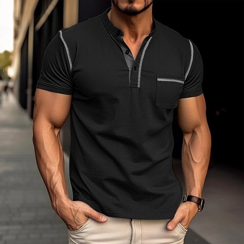Man wearing a grey slim-fit Henley t-shirt with jeans. Perfect casual summer outfit for men's fashion.