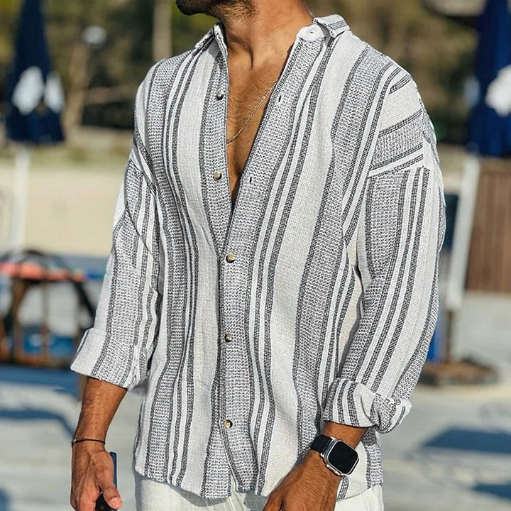 Stylish men's striped button-down long sleeve shirt, perfect for casual outings or versatile everyday fashion.