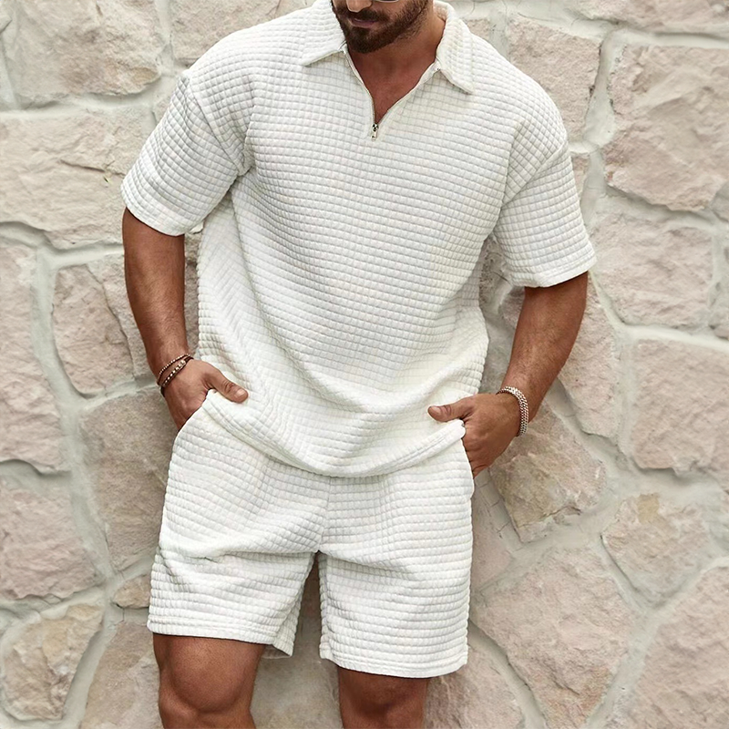 Men's casual summer set featuring a stylish half-zip polo shirt and comfortable matching shorts for warm weather.