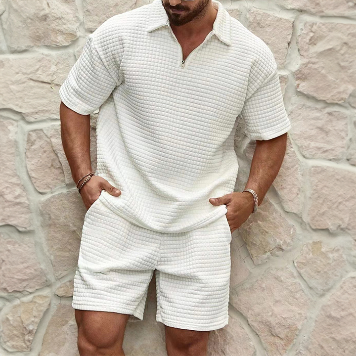 Men's casual summer set featuring a stylish half-zip polo shirt and comfortable matching shorts for warm weather.