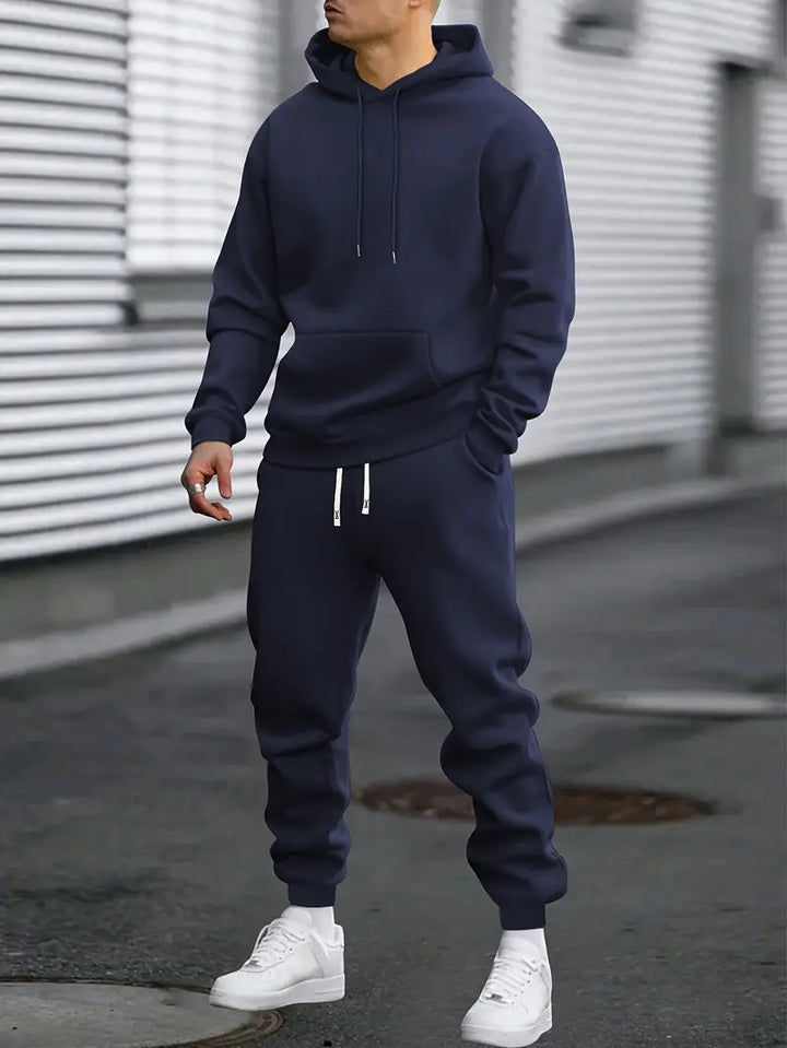 Two-piece men's loungewear set with a casual sweater and matching joggers for comfort.