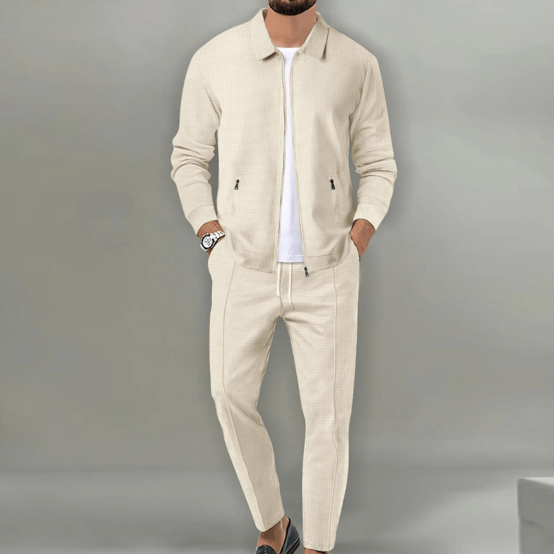 Men's casual tracksuit featuring a black zip-up jacket and matching joggers for athletic or loungewear.