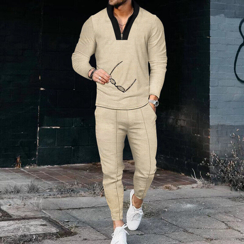 Men's casual two-piece tracksuit in navy, featuring a zip-up top and matching comfortable trousers.