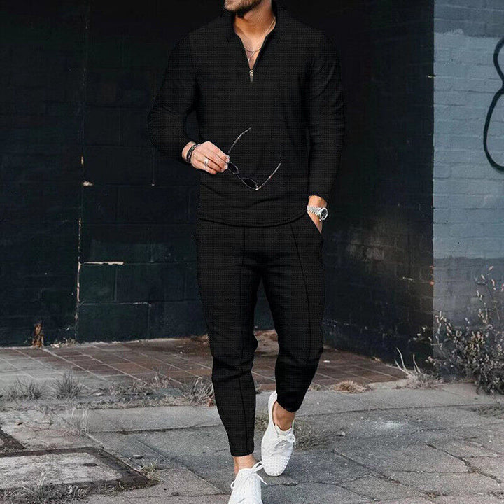 Sporty casual men's loungewear set with a zip-top and trousers, perfect for relaxed wear.