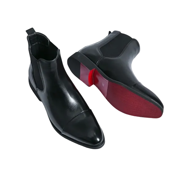 Men's classic black Chelsea boots with elastic side panels, perfect for dressy or casual men's fashion. Slip-on ankle boots.