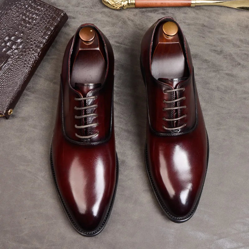 Elegant men's brown leather Oxford dress shoes for weddings, special occasions, and formal evening events.