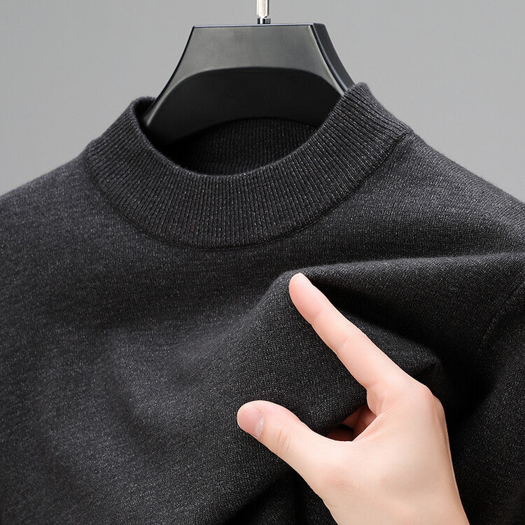 Stylish men's classic mock neck pullover sweater in a neutral tone, versatile long sleeve knitwear for daily wear.