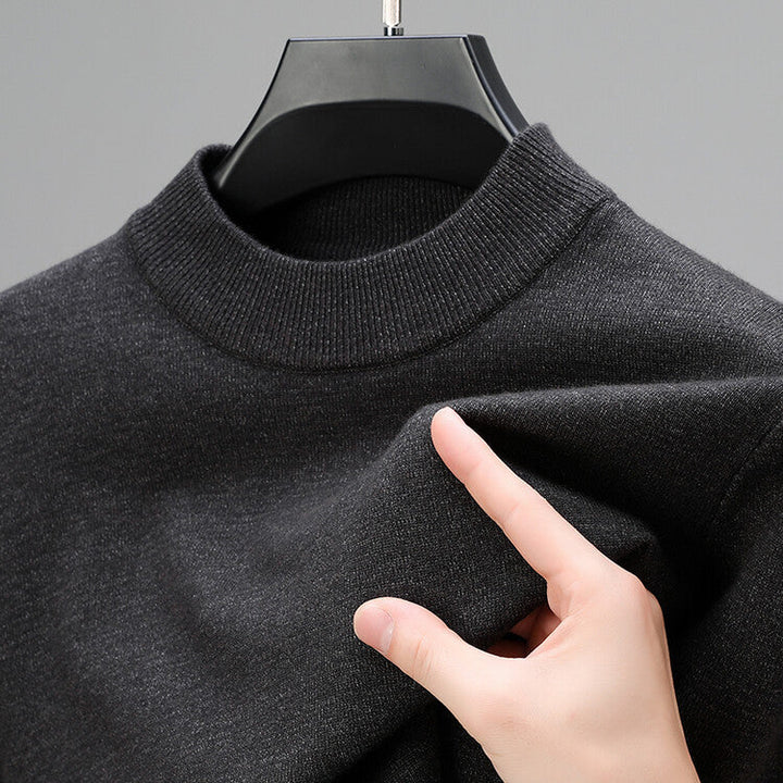 Stylish men's classic mock neck pullover sweater in a neutral tone, versatile long sleeve knitwear for daily wear.