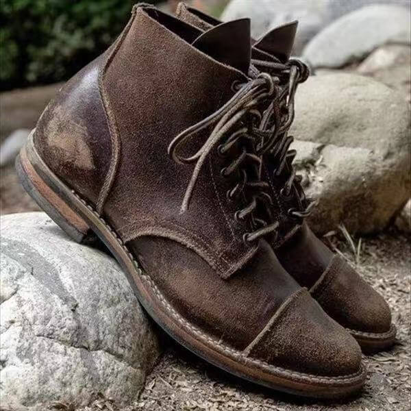 Men's classic brown leather boots, timeless style & durable construction for all-day comfort. Perfect dress or casual footwear.