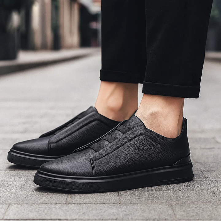 Comfortable men's slip-on sneakers in a classic design. Versatile casual footwear for everyday style.