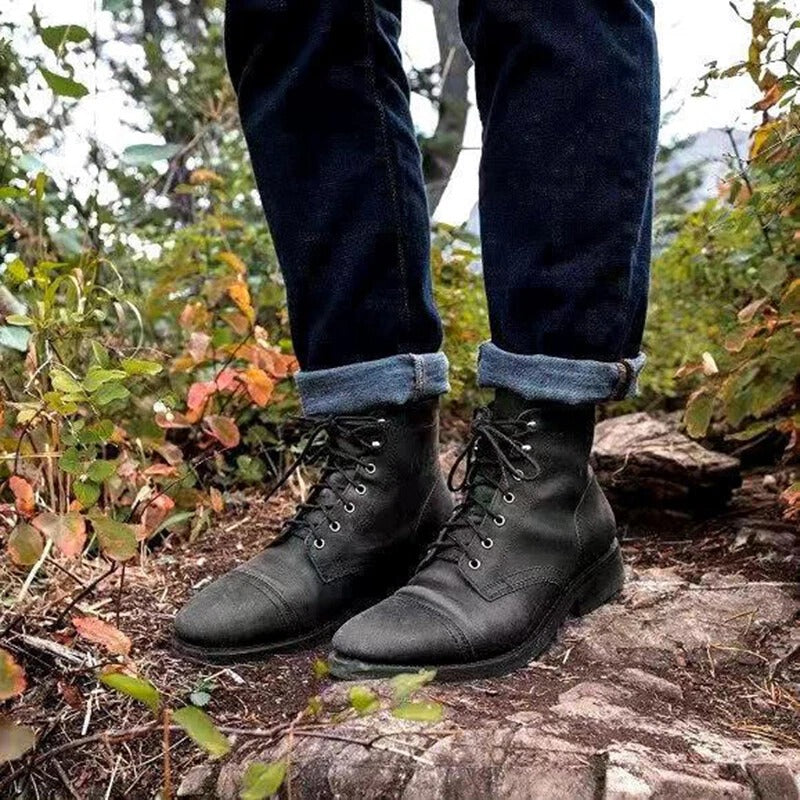 Durable men's lace-up ankle boots for everyday wear. Closed toe design, perfect for fall/winter fashion.