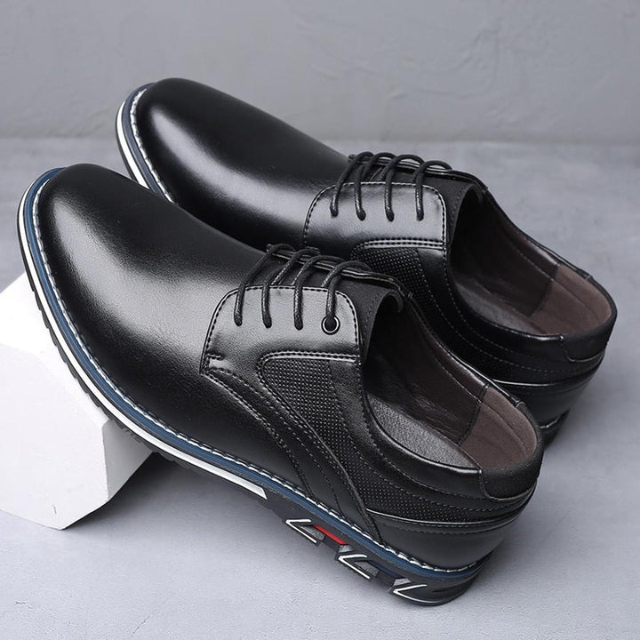 Pair of men's versatile lace-up footwear, perfect as anti-slip casual oxford style shoes for men.