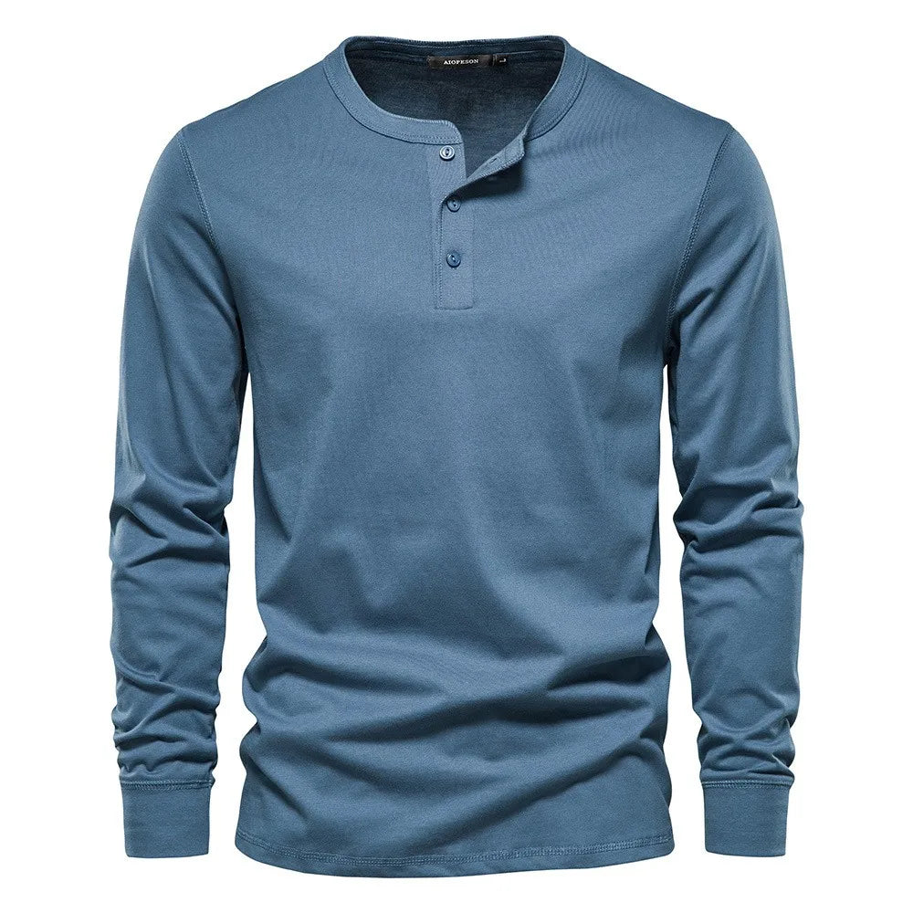 Comfortable men's long sleeve henley shirt with a three-button placket, ideal for everyday wear.