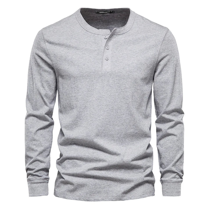 Versatile men's fashion long sleeve button henley shirt, suitable for various occasions.