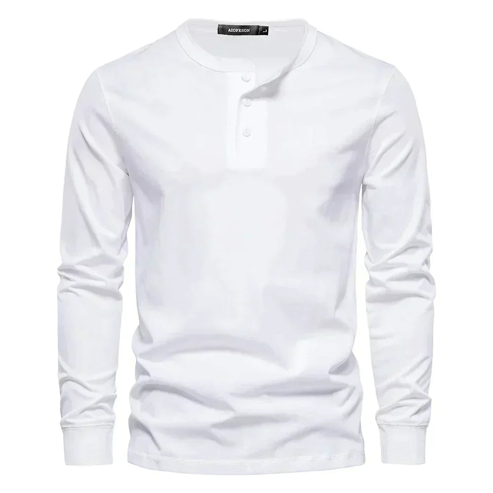 Model wearing a men's long sleeve henley shirt, showcasing its casual fit and style.