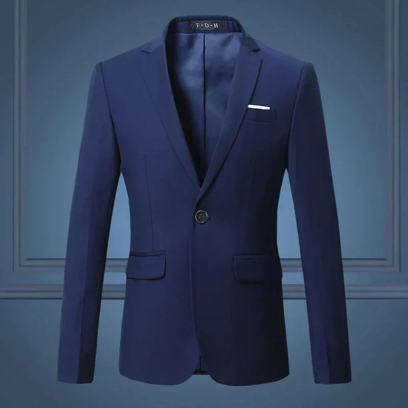 Close-up of a men's tailored suit blazer, showcasing fabric texture and single button detail
