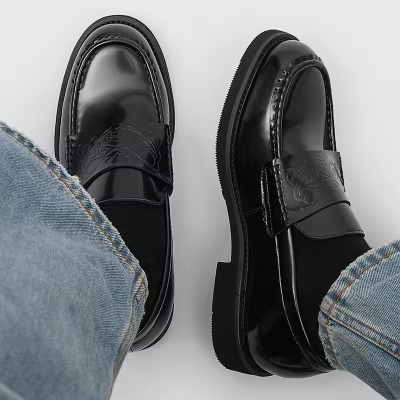 Stylish men's slip-on loafers with a polished finish. Ideal classic dress shoes for formal events & business casual.