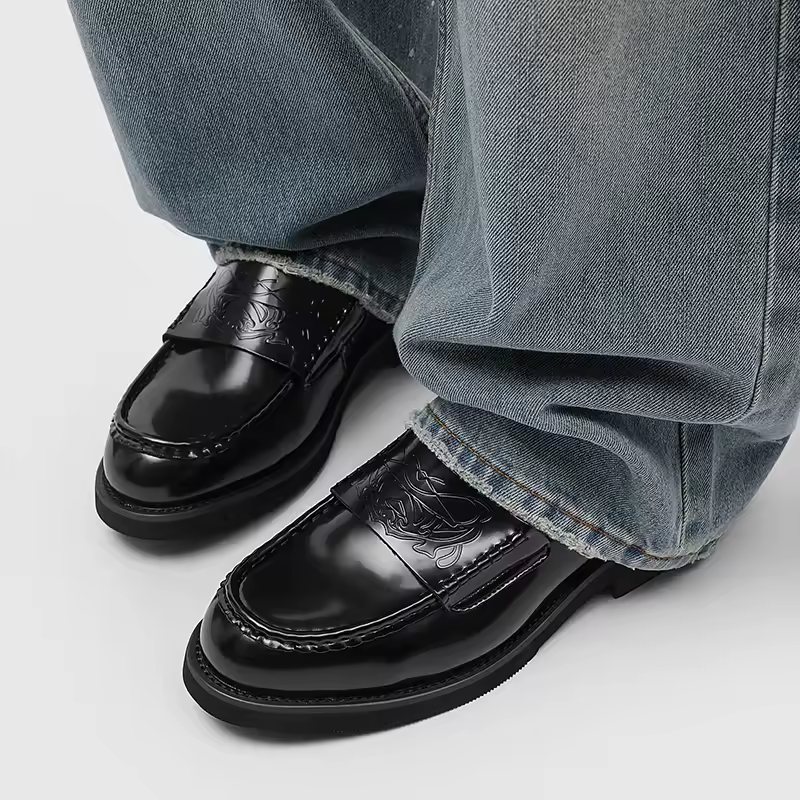 Men's fashion classic loafers for a sophisticated look. Polished black slip-on shoes, great for dress or business casual.