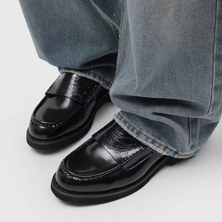 Men's fashion classic loafers for a sophisticated look. Polished black slip-on shoes, great for dress or business casual.