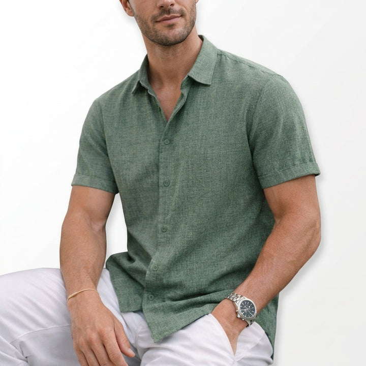 Comfortable men's short sleeve button shirt with tailored fit, ideal for everyday casual wear.