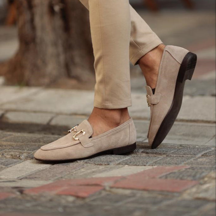 Timeless brown horsebit loafers for men, offering superior comfort and sophisticated slip-on style.