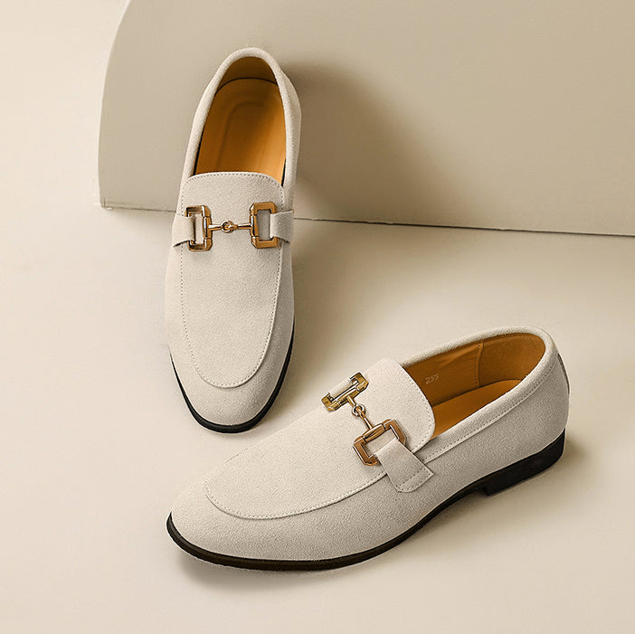 Stylish men's dress loafers with a distinctive horsebit accent, perfect for formal or casual outfits.