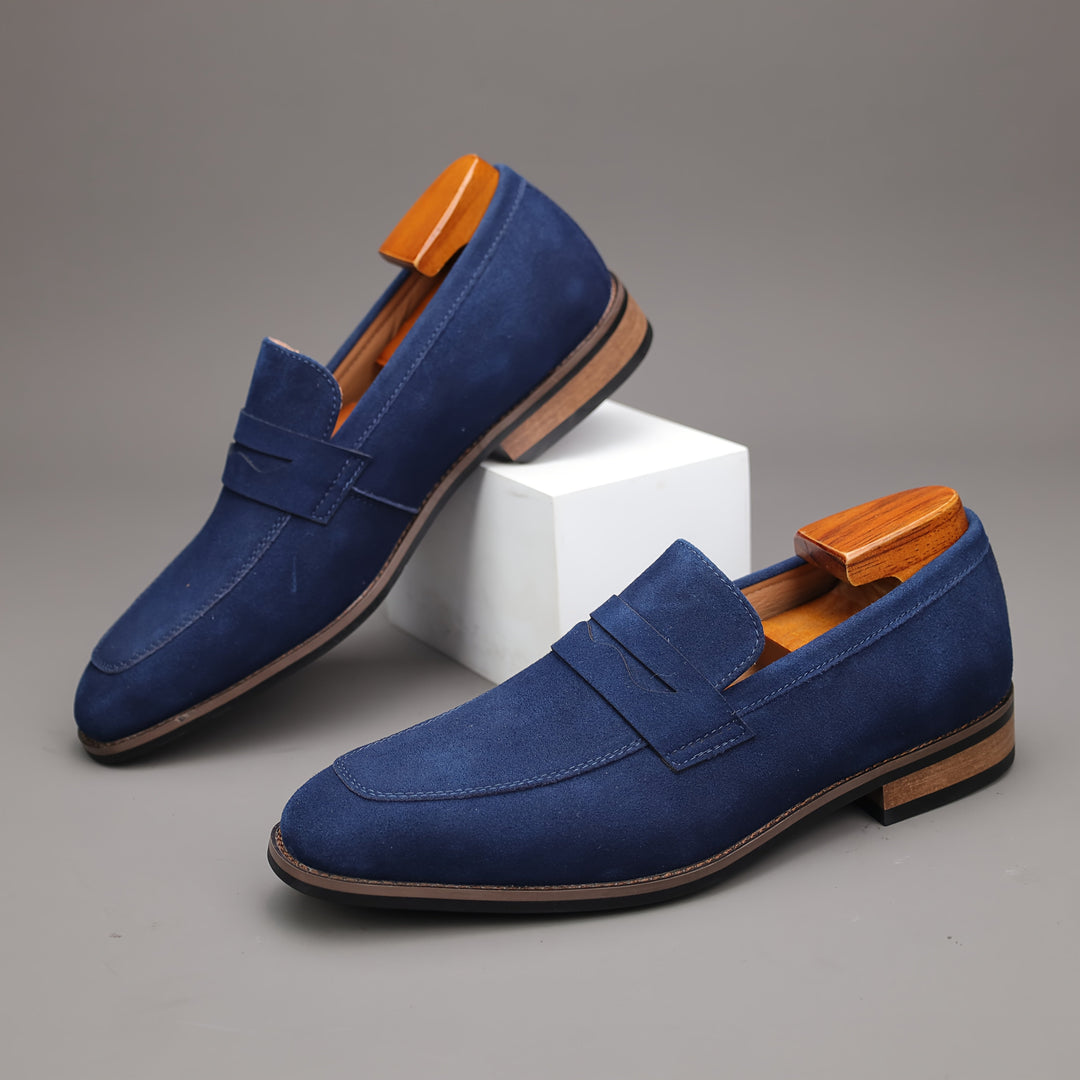 Men's comfortable casual slip-on loafers in brown, styled with chinos for a relaxed everyday look.