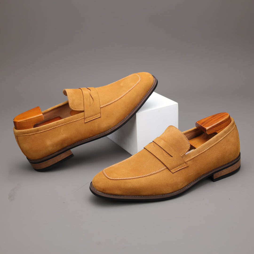 Stylish men's dress loafers, slip-on design in brown, paired with formal trousers for office or events.