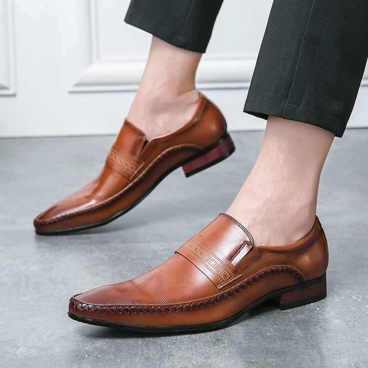 Elegant brown men's slip-on loafers with classic penny slot, ideal for formal footwear and everyday wear.