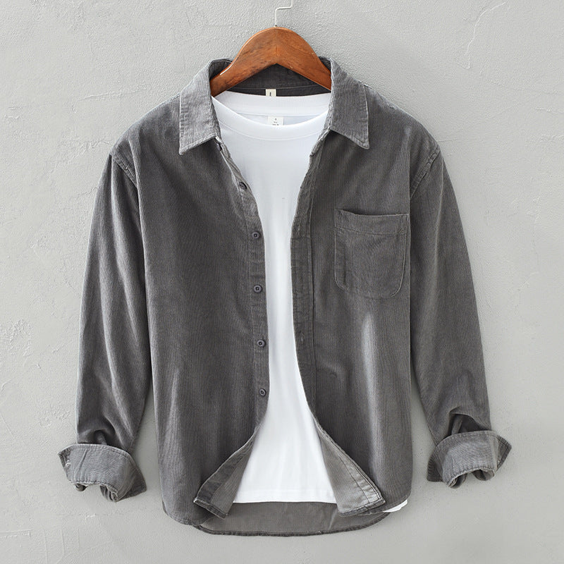 Men's classic textured button-up shirt with long sleeves & chest pocket, ideal for casual everyday style.