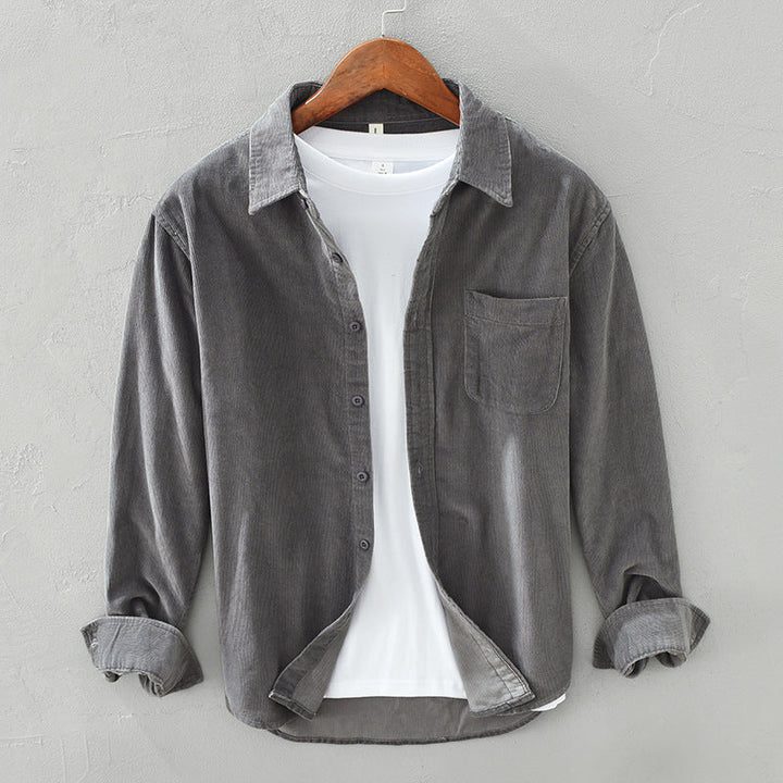 Men's classic textured button-up shirt with long sleeves & chest pocket, ideal for casual everyday style.