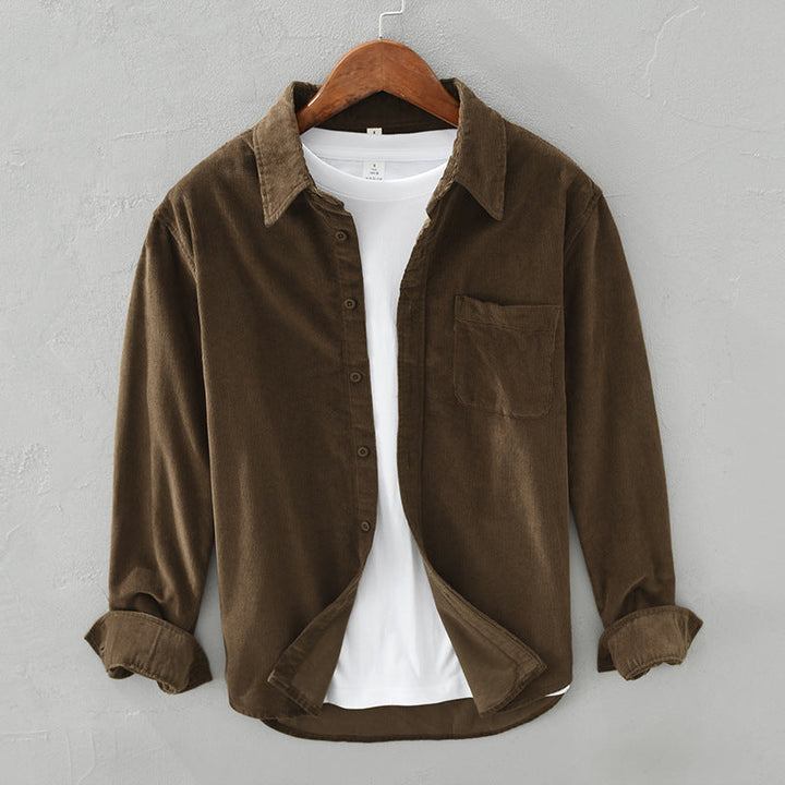 Classic men's long-sleeve textured button-up shirt, perfect as a comfortable layering piece.
