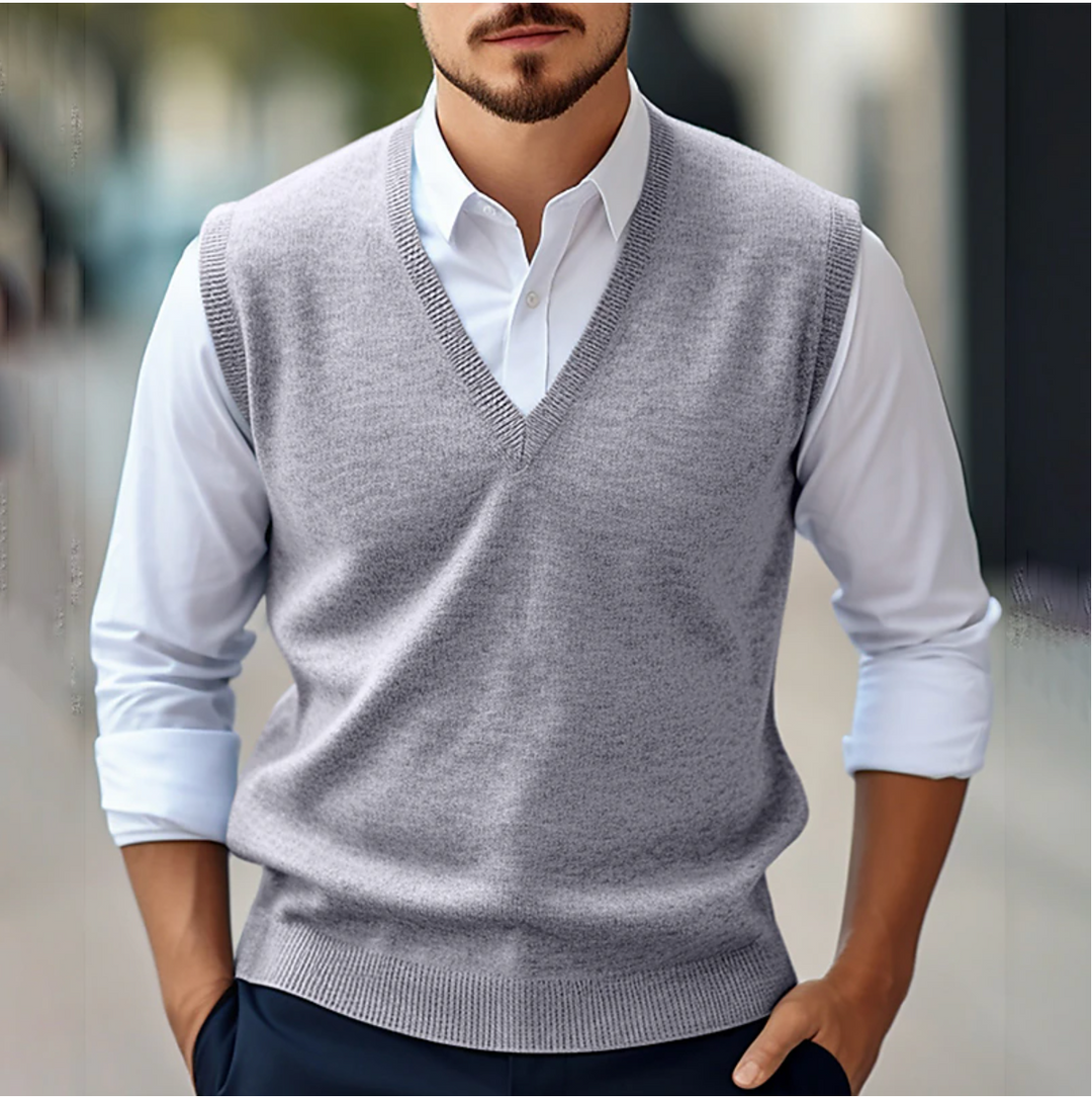 Stylish red men's V-neck sleeveless sweater vest, an ideal all-season layering piece for casual wear.