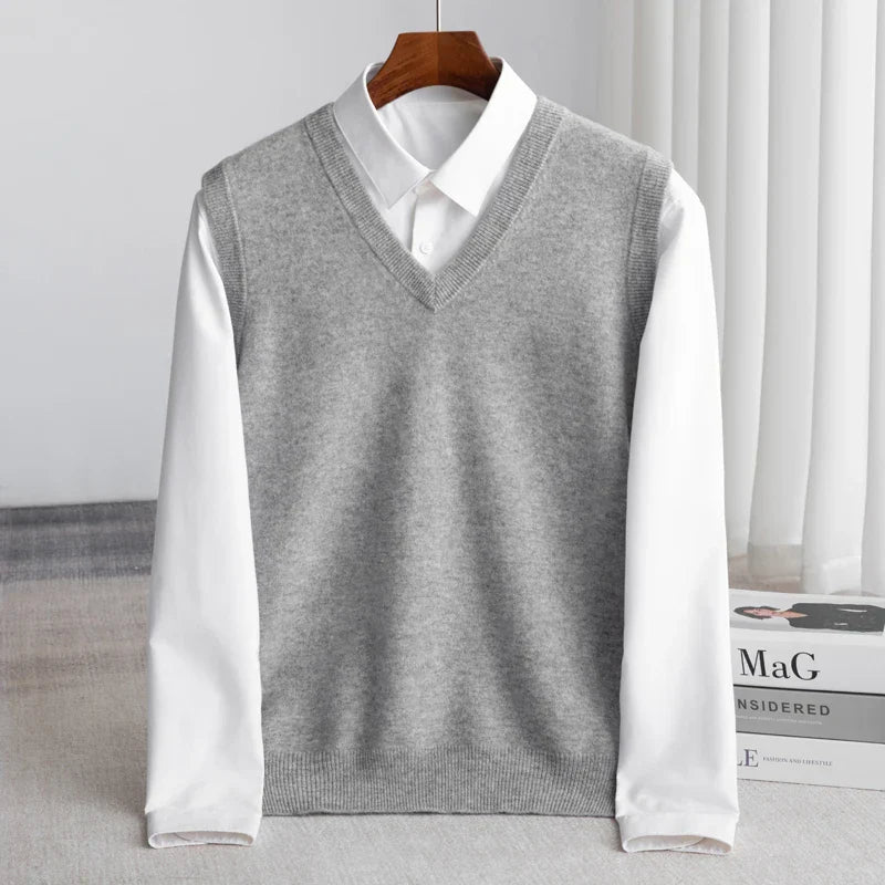 Essential men's V-neck sweater vest for smart layering; perfect for classic business casual style.