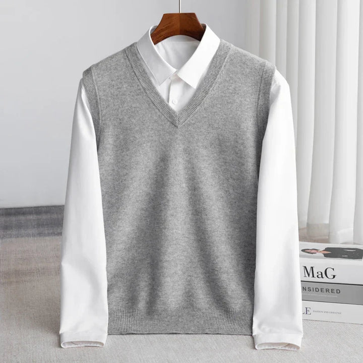 Essential men's V-neck sweater vest for smart layering; perfect for classic business casual style.