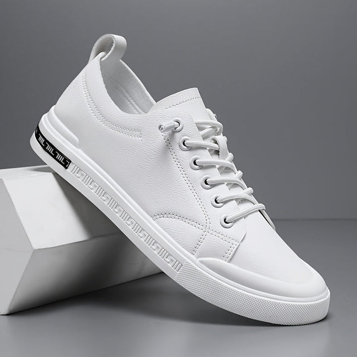 Men's classic white everyday sneakers with laces for casual comfort & street style.
