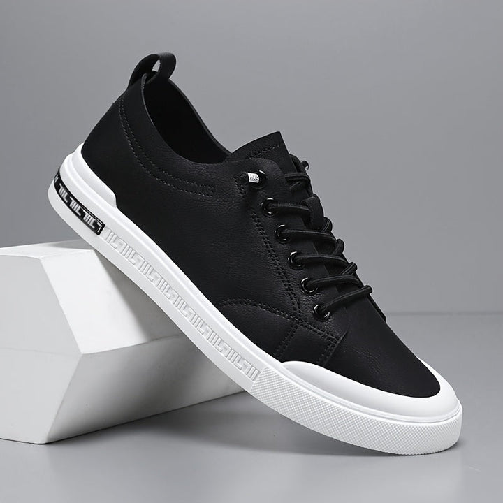 Close-up of men's everyday casual sneakers, highlighting comfortable sole and stylish design for versatile footwear.