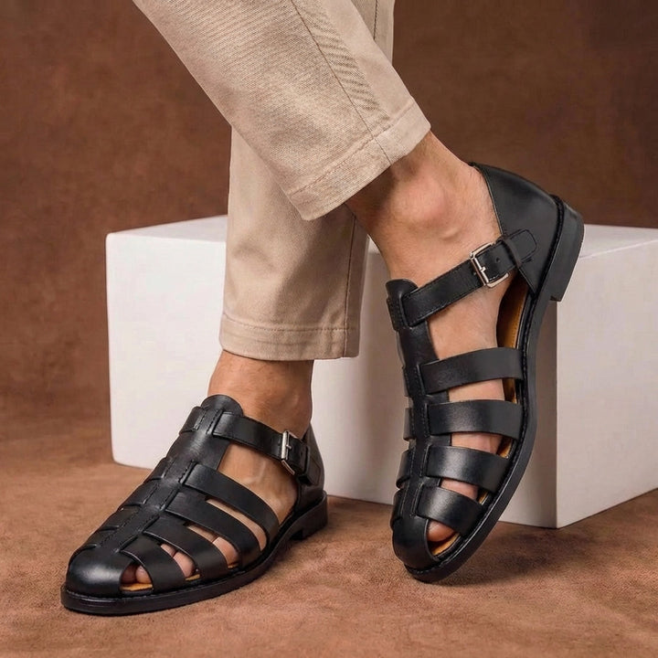 Durable men's fisherman sandals with a closed toe and adjustable buckle strap for secure outdoor comfort.