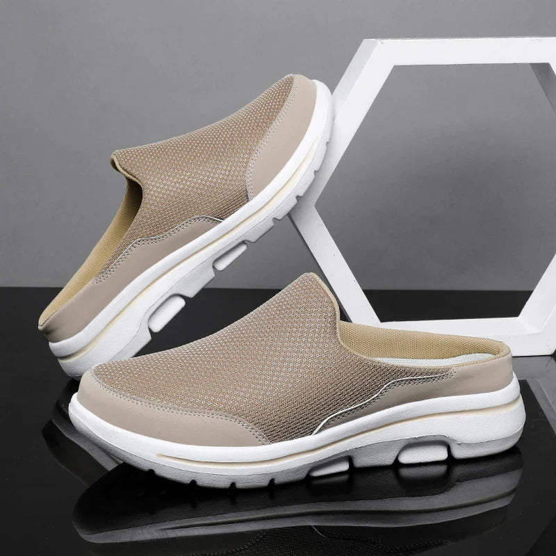 Men's closed-toe slip-on mule sandals providing protection and comfort, perfect for warm weather.